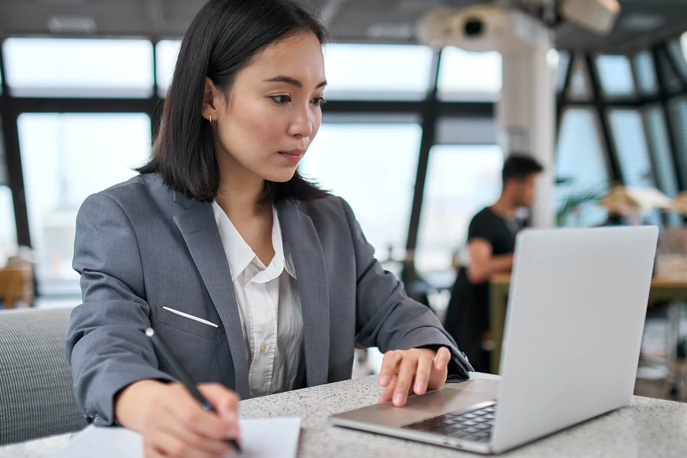 Tax & Finance Compliance Services | Paro.ai 1 woman-with-laptop-plans-business-tax