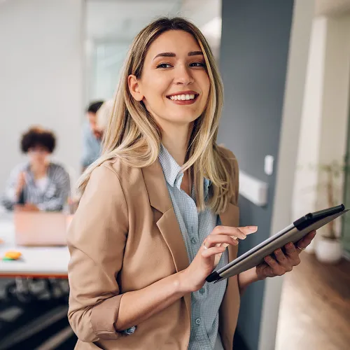 Partner Access 7 woman smiling with tablet
