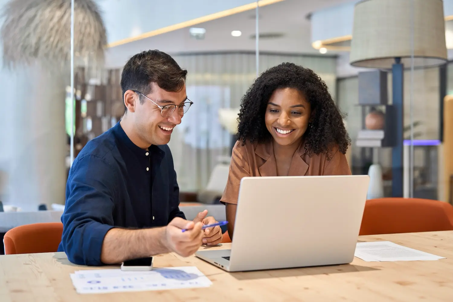 What Is a C Corporation? Pros, Cons and When To Consider Forming One 1 Two business partners discuss forming a C Corp