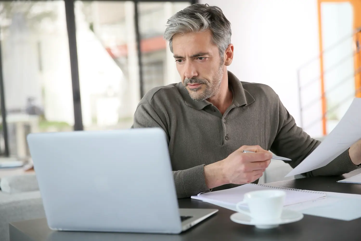 How To Calculate Cost of Goods Sold (and Why It Matters) 1 A business owner calculates his cost of goods sold