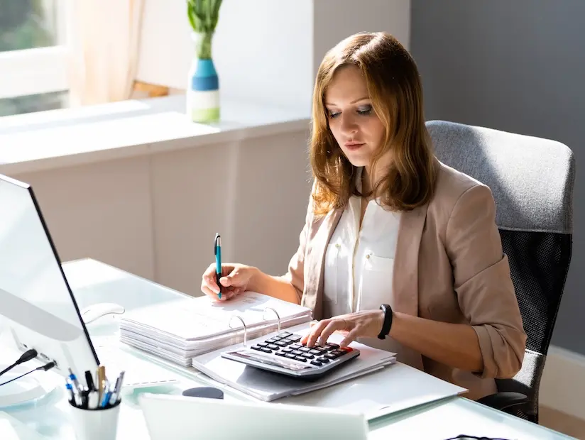 accounting-for-startups.webp Accountant working on a computer