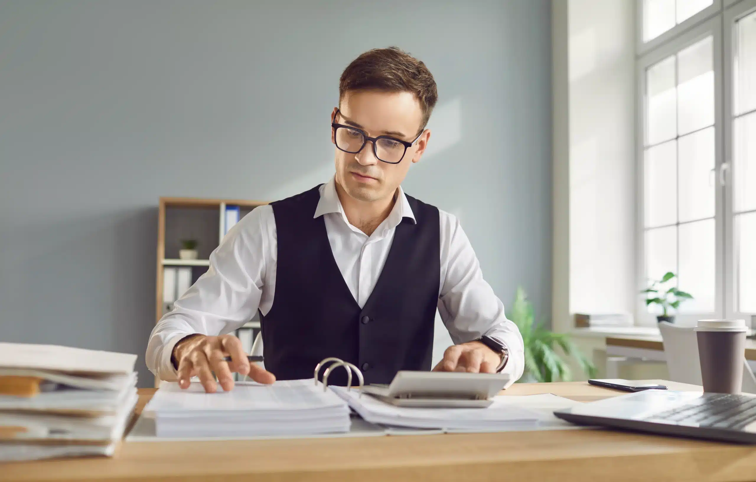 A business owner reviews his rolling forecast