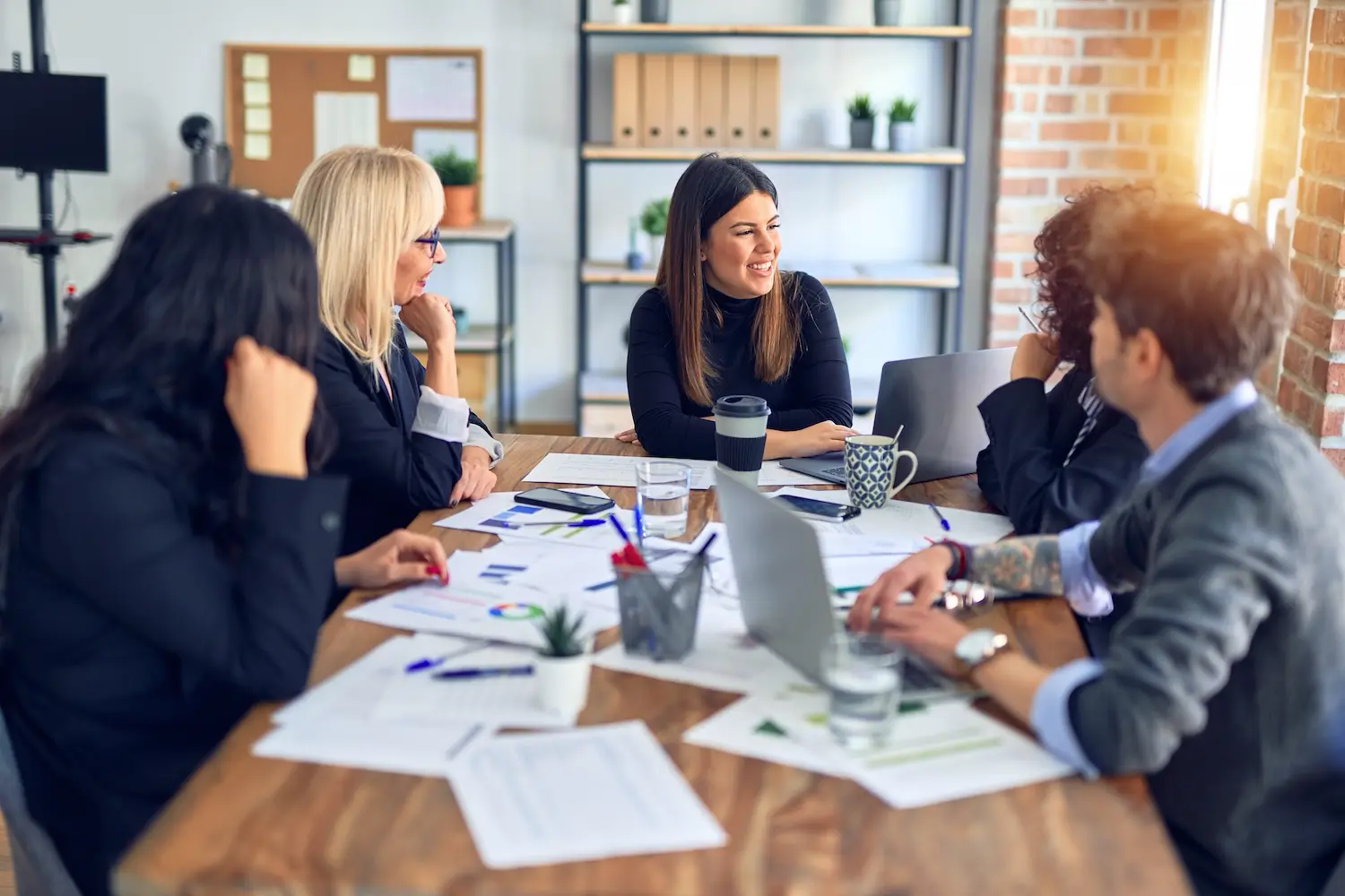 A startup team reviews their cash runway forecasts.